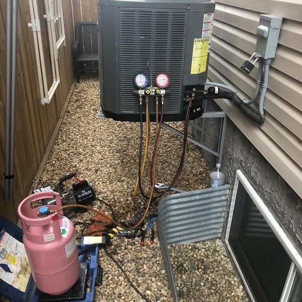 AC repair in Edmonton AB, evaporator coil refrigerant line rubbing