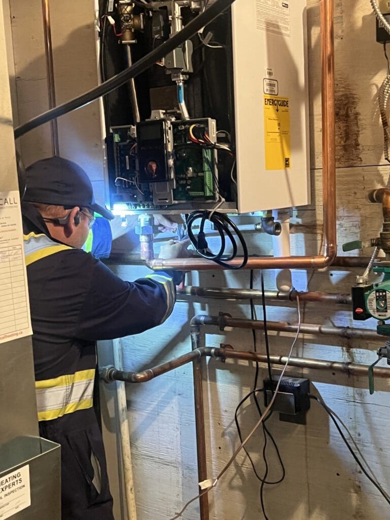 high efficiency gas boiler in progress installation Edmonton AB